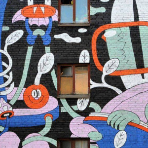 Читающая лягушка и сказочным мир появились на стене Владимира