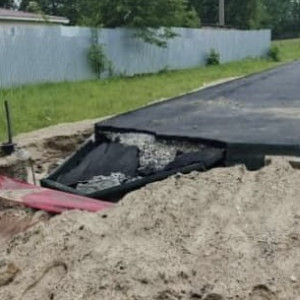 В Кольчугино дождь едва не сорвал благоустройство спортивной площадки