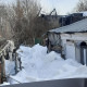 В Коврове снег с крыши завалил выход из частного дома пенсионера