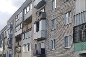 В поселке под Александровом полицейский спас повисшую на 4 этаже бабушку